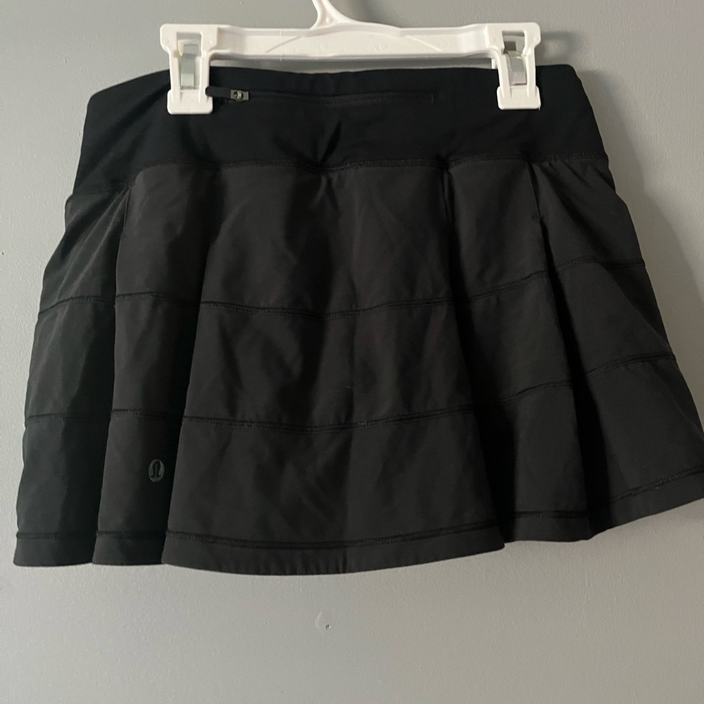 Selling a black lululemon athletic skirt. Size 4 regular.